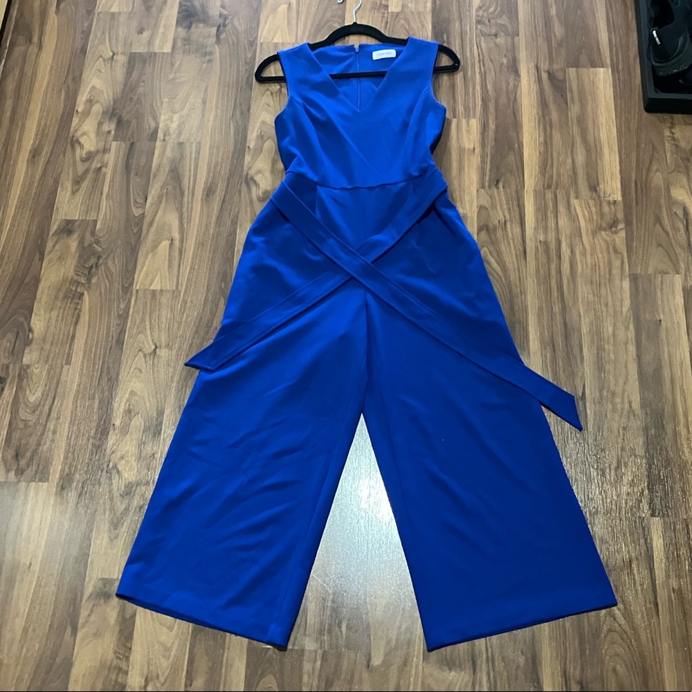 Sleeveless V-Neck Tie Waist Cropped Calvin Klein Jumpsuit. Size 2. Royal Blue